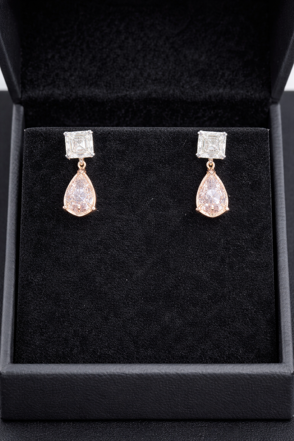 14K white and rose gold fancy pink diamond drop earrings featuring sparkling pink diamonds and elegant design.