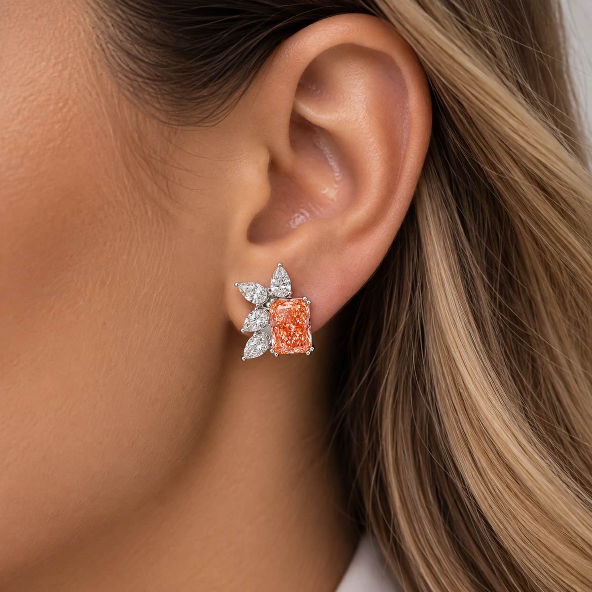 14K fancy pink diamond and pear cut diamond earrings by Colorlabdiamonds featuring radiant cut and elegant design.