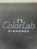 14K white and rose gold fancy pink diamond drop earrings with intricate design and sparkling pink diamonds.