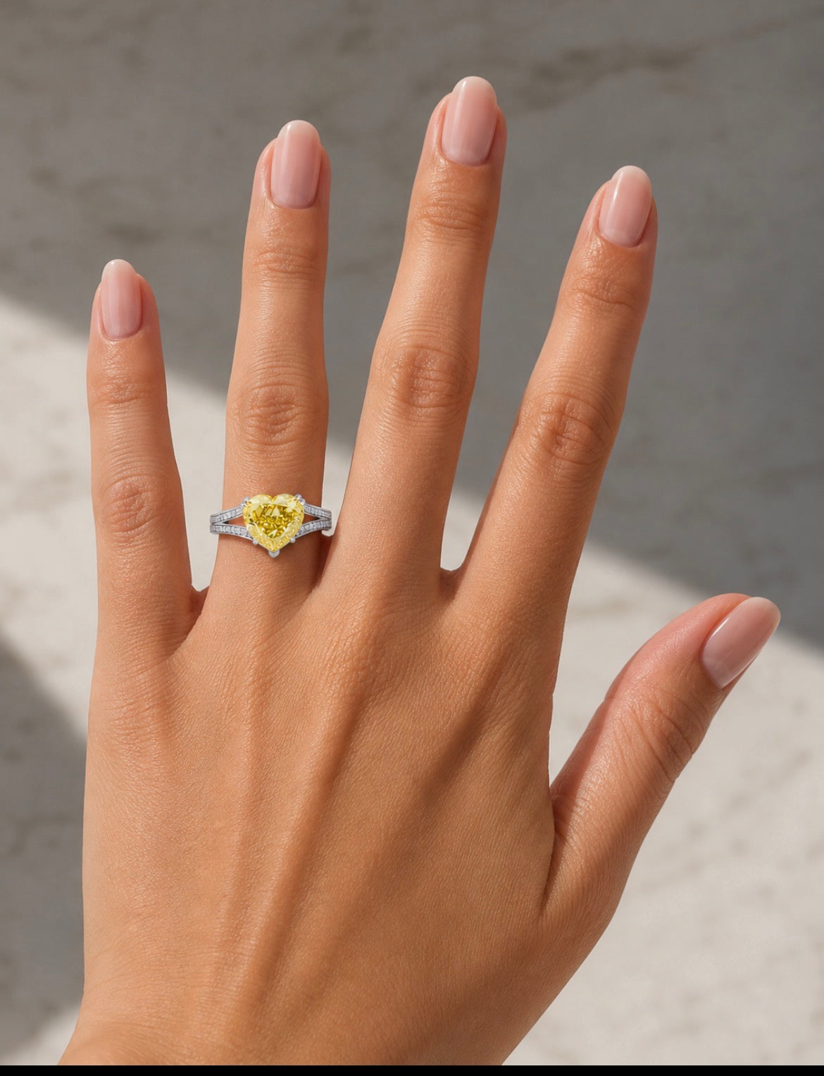 14K white gold heart-shaped diamond ring with yellow accents and IGI 4.59ctw, featuring fancy yellow diamonds by Colorlabdiamonds.