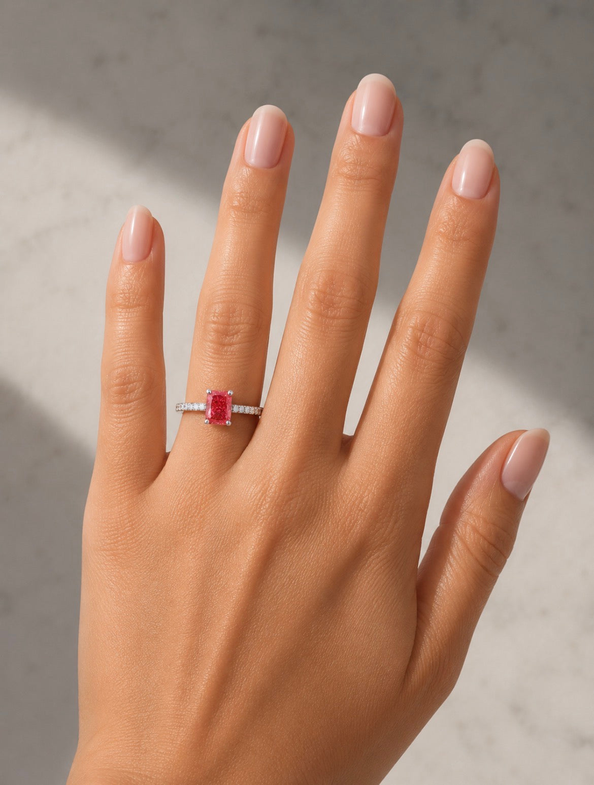 14K white gold diamond ring featuring a fancy vivid pink radiant cut diamond, 1.19 carats total weight, from Colorlabdiamonds.