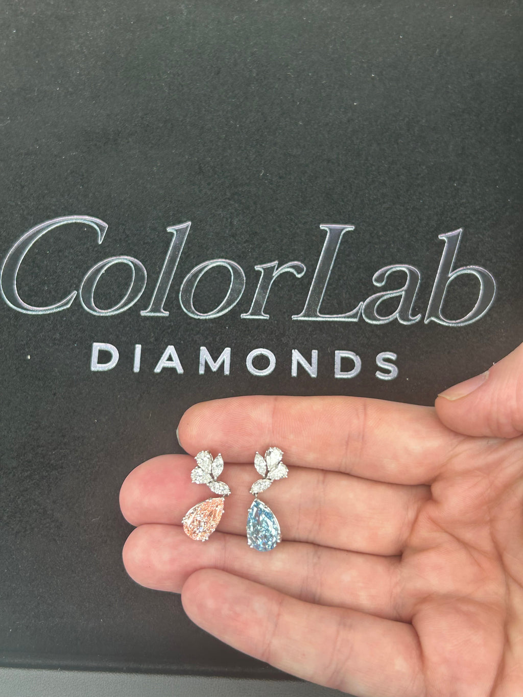 14K gold pink and blue diamond drop earrings featuring fancy cut stones with elegant design and sparkling brilliance.