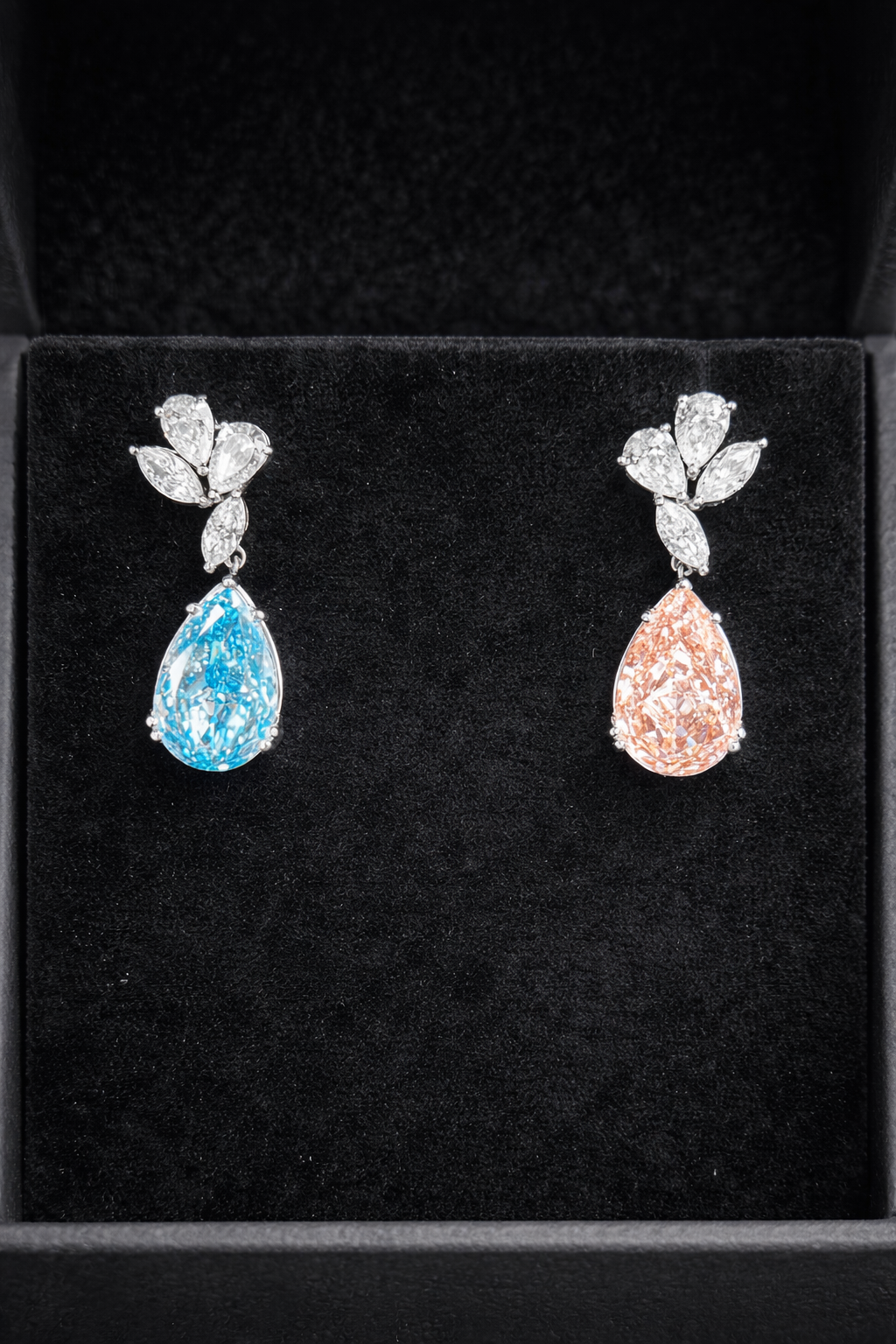 14KT white gold fancy pink and blue diamond drop earrings with sparkling gemstones and elegant design.