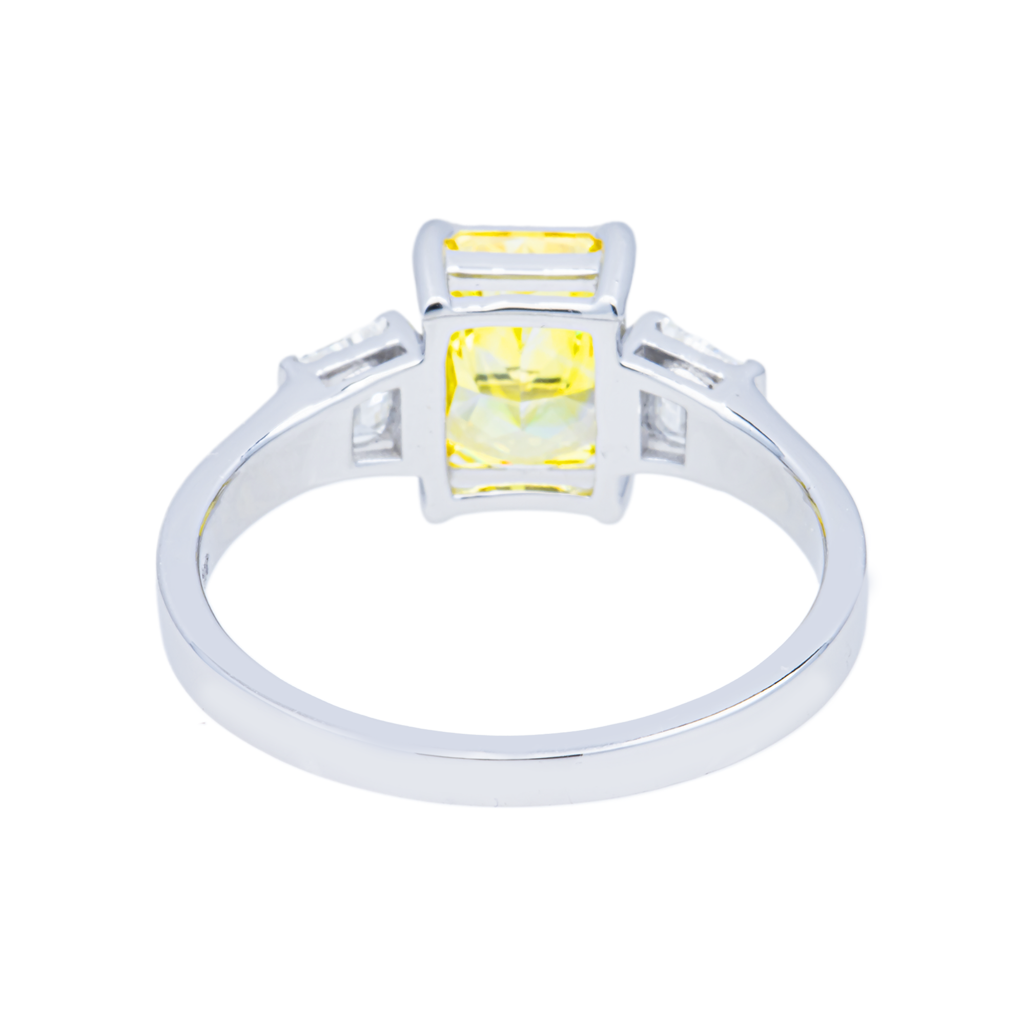Close-up of a color-enhanced diamond from Colorlabdiamonds showing vibrant hues and intricate cut details.