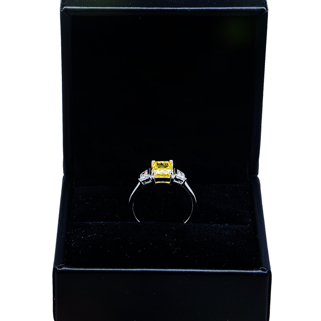 14K white gold diamond ring featuring radiant yellow fancy diamonds, 1.89 carats total weight, from Colorlabdiamonds.