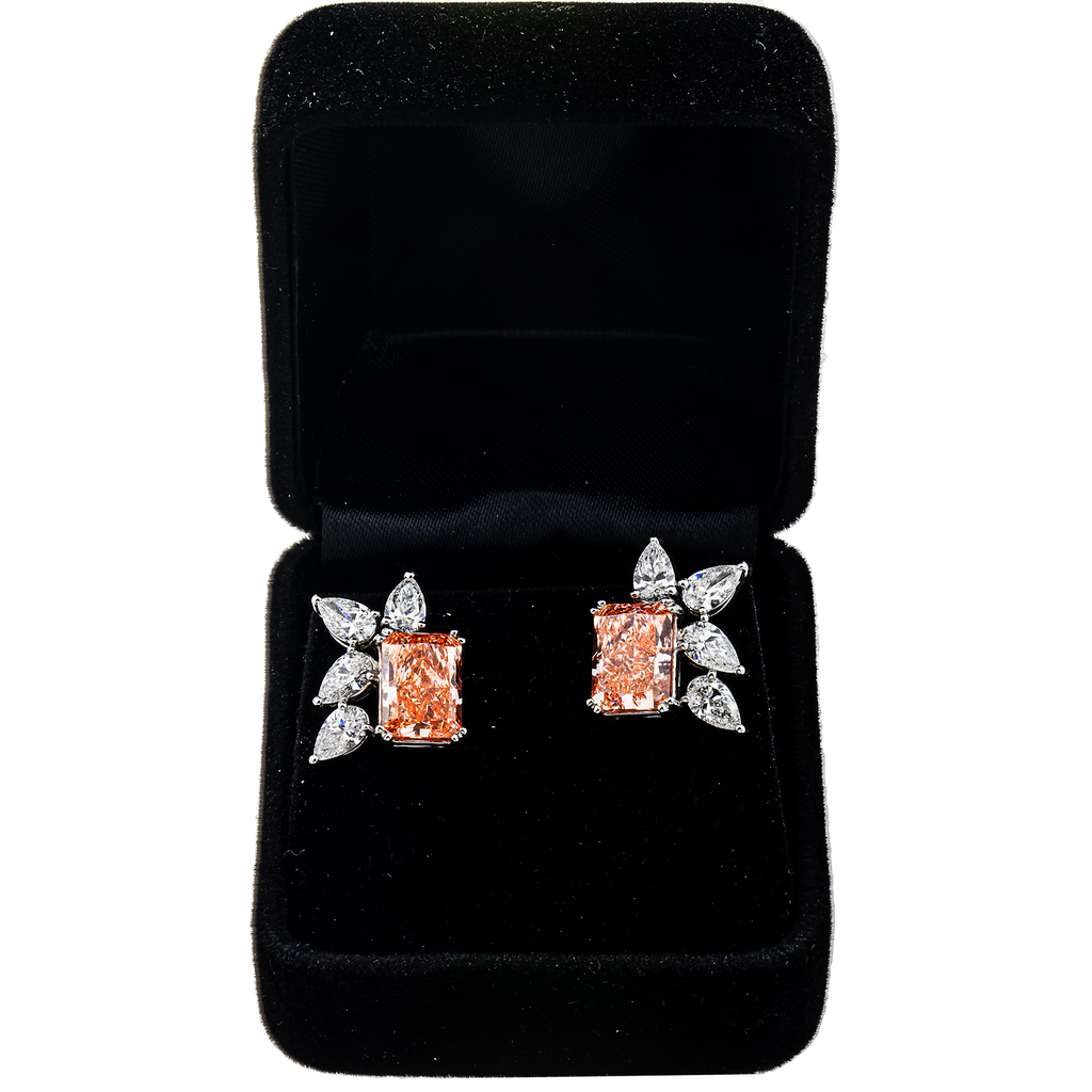 14K pink diamond and pear cut diamond earrings by Colorlabdiamonds featuring radiant cut pink and clear diamonds in elegant setting