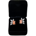 14K pink diamond and pear cut diamond earrings by Colorlabdiamonds featuring radiant cut pink and clear diamonds in elegant setting