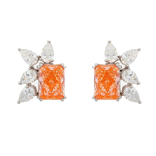 14K pink diamond and pear cut diamond earrings with radiant cut stones, showcasing elegant jewelry from Colorlabdiamonds.