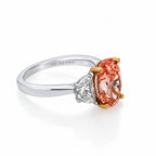 18k white gold fancy pink oval cut diamond ring with 5.64 carats, showcasing a luxurious and elegant jewelry design.