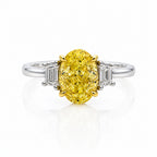 18K white gold fancy pink diamond ring with an oval cut 2.54ctw center stone, showcasing elegant jewelry design.