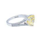 14K white gold fancy yellow heart-shaped diamond ring with IGI 4.59 carat total weight, featuring sparkling diamonds and intricate design.