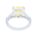 14K white gold fancy yellow heart-shaped diamond ring with IGI 4.59ctw, featuring intricate design and sparkling gemstones.