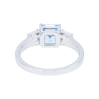 14K white gold fancy blue Asscher cut diamond ring featuring a sparkling blue gemstone and intricate band design.