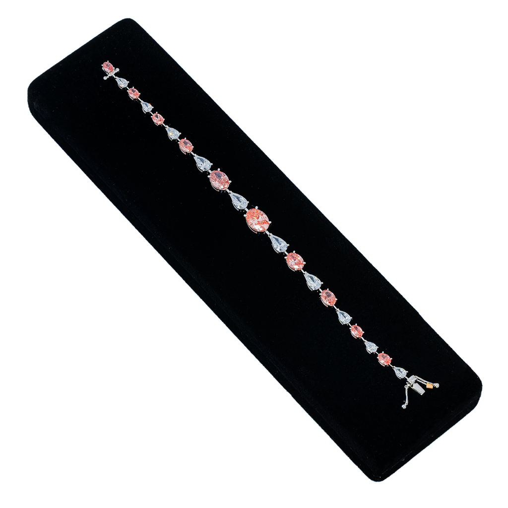 Colorlabdiamonds 18KT white gold pink and white diamond bracelet featuring oval and pear-cut diamonds with 11.18 carats total weight.