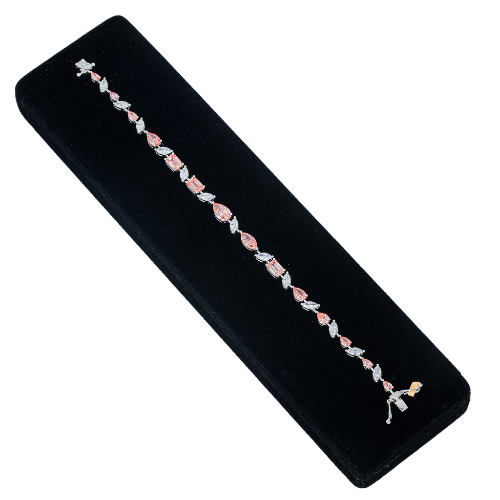 18KT white gold diamond bracelet with pink pear, marquise, and emerald cut diamonds from Colorlabdiamonds.