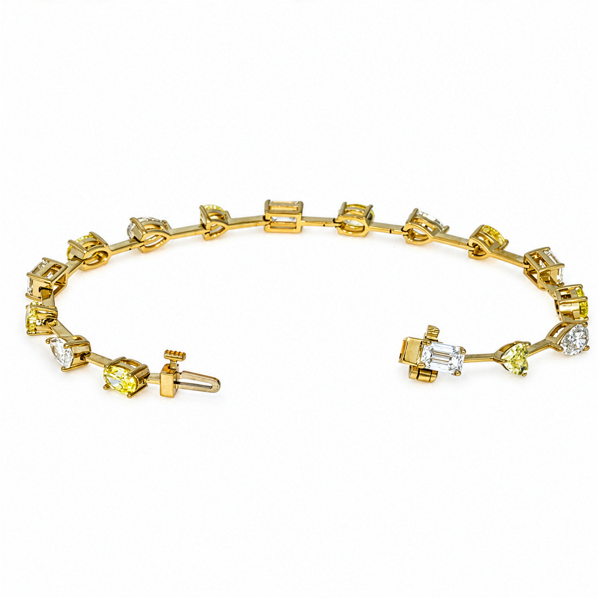 14K yellow gold diamond bracelet featuring mixed cut yellow and white diamonds totaling 8.49 carats by Colorlabdiamonds.