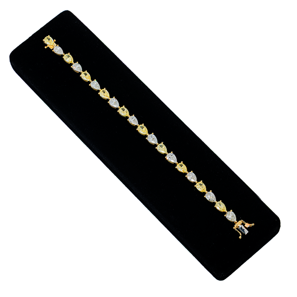 Colorlabdiamonds 18KT two-tone yellow and white diamond bracelet with pear-cut diamonds, 14.79 carats, elegant jewelry piece.