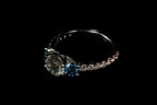14K white gold triple diamond blue ring with 2.31 ctw, featuring elegant blue and white gemstone accents.